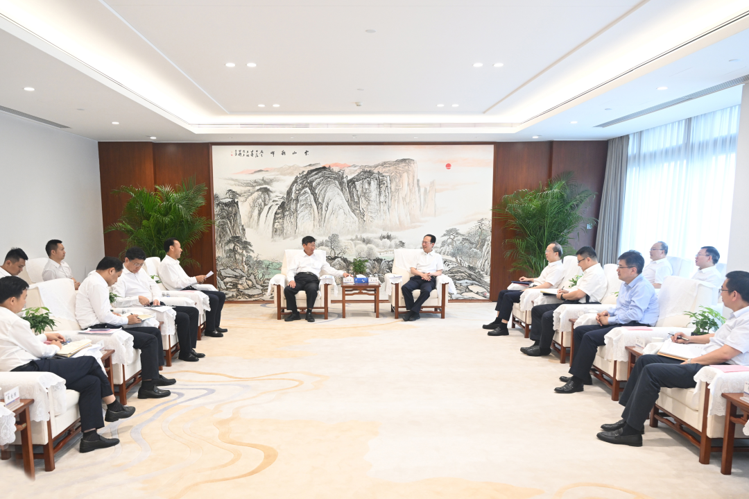 中國電建黨委書記、董事長丁焰章與中國三峽集團董事長、黨組書記劉偉平會談